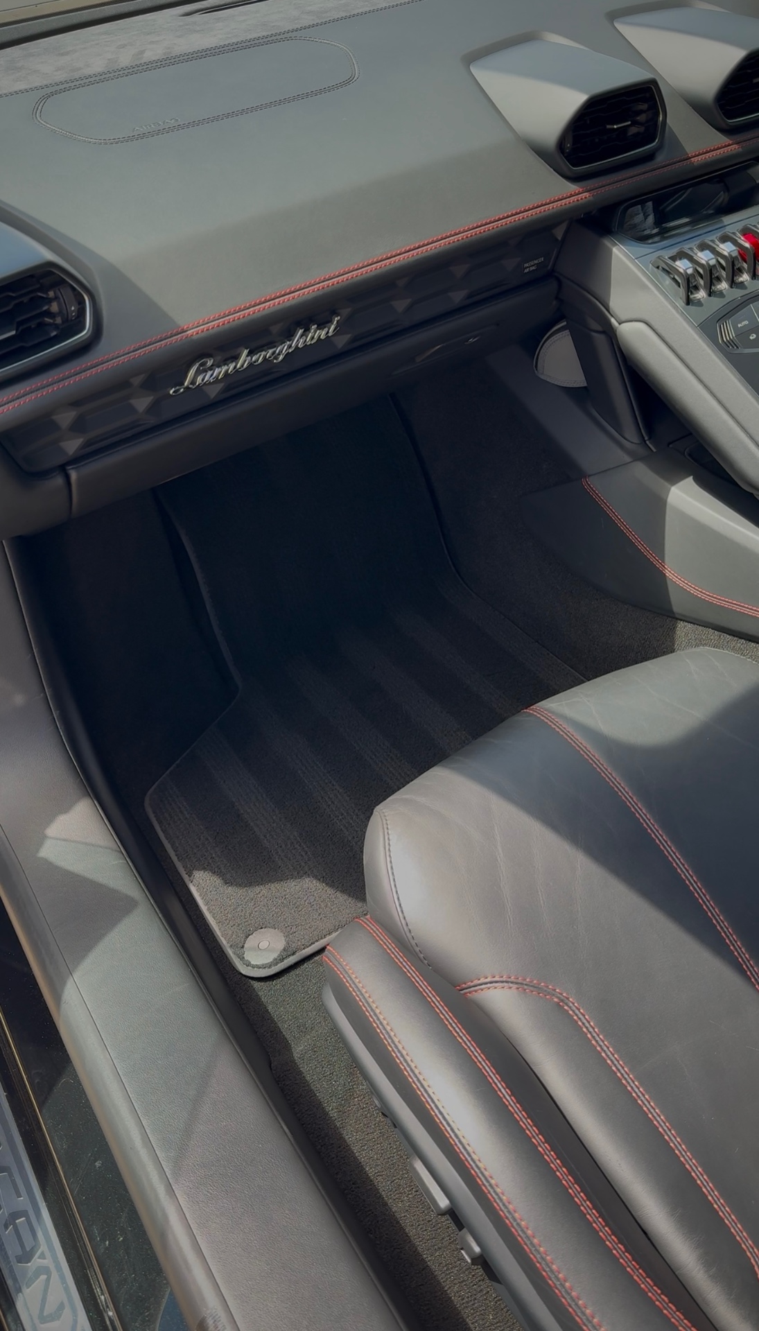 Lamborghini Huracán interior with detailed leather and red stitching
