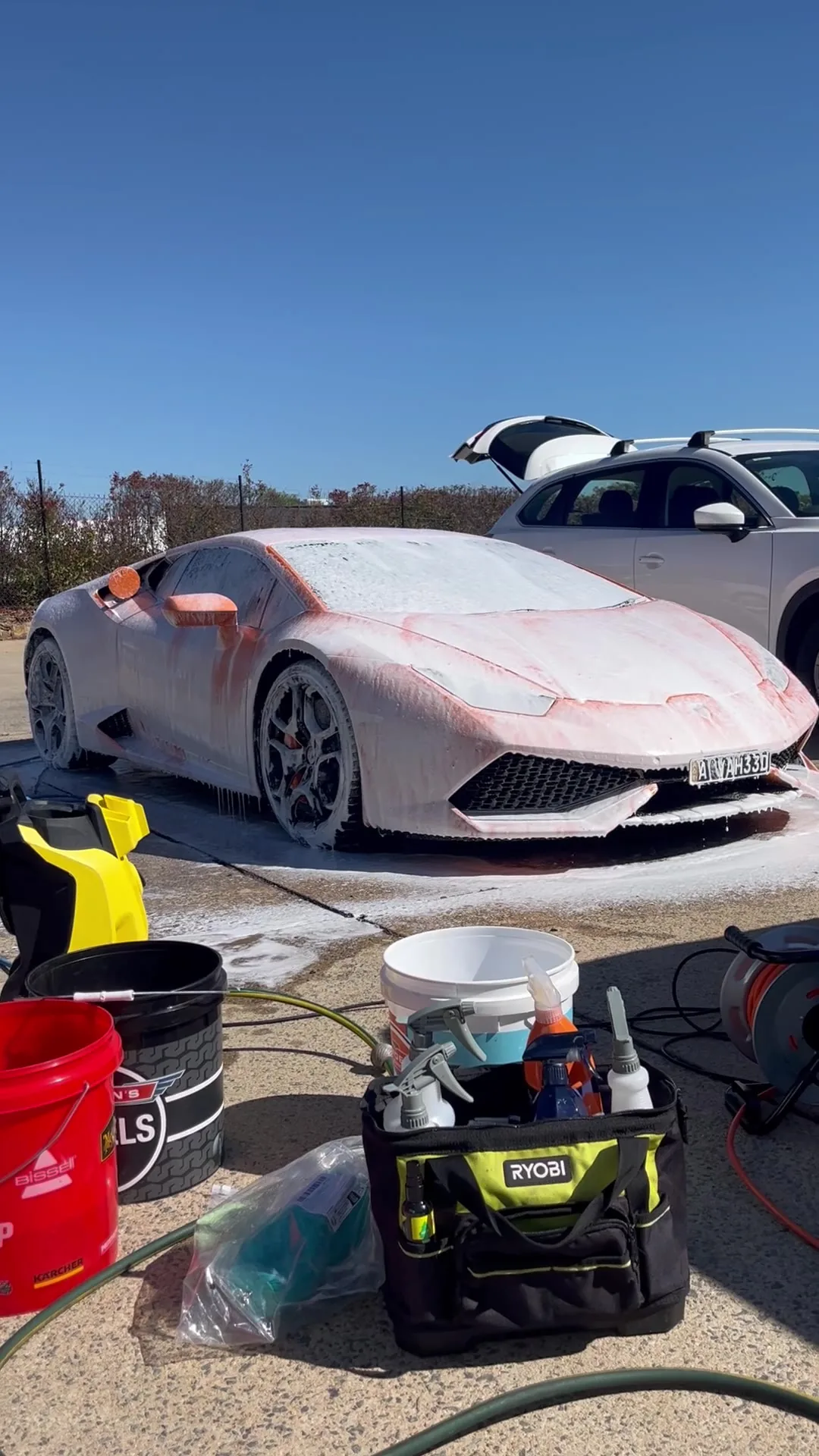 Lamborghini Huracán covered in snow foam during an exterior detail